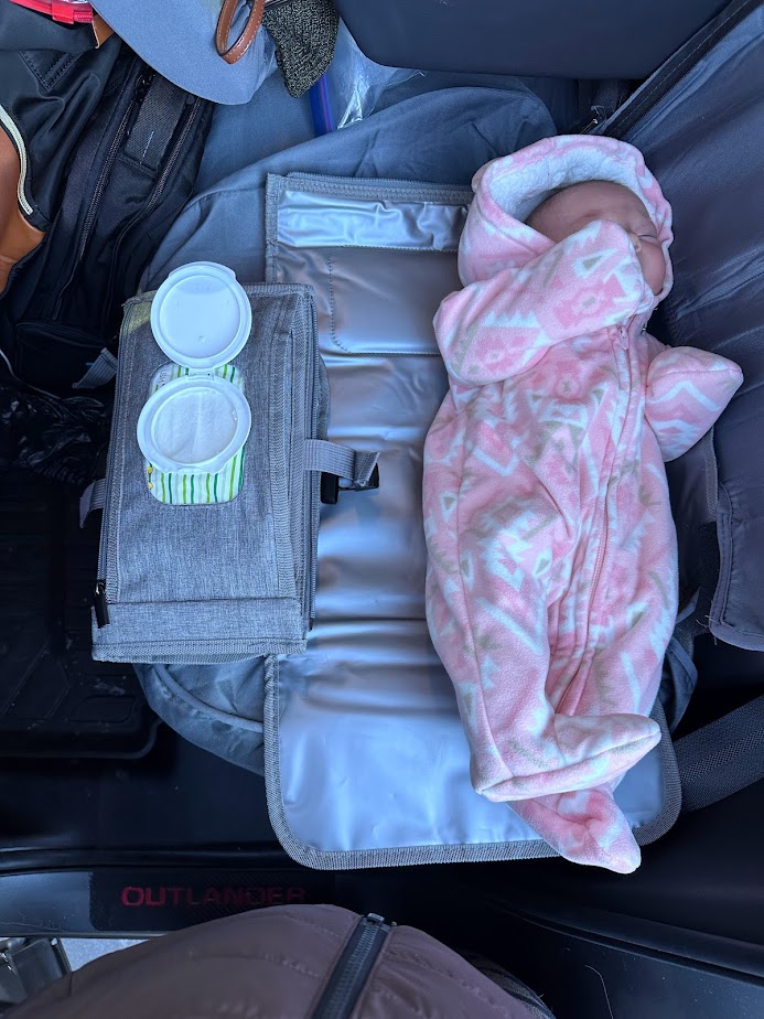 Pack a portable diaper changing pad for sanitary changes on the road