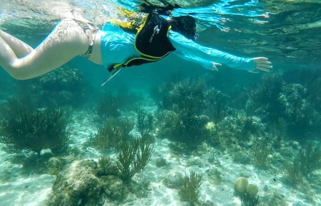 Choosing activities that do not wear you out, such as swimming, is an important pregnancy travel tip.