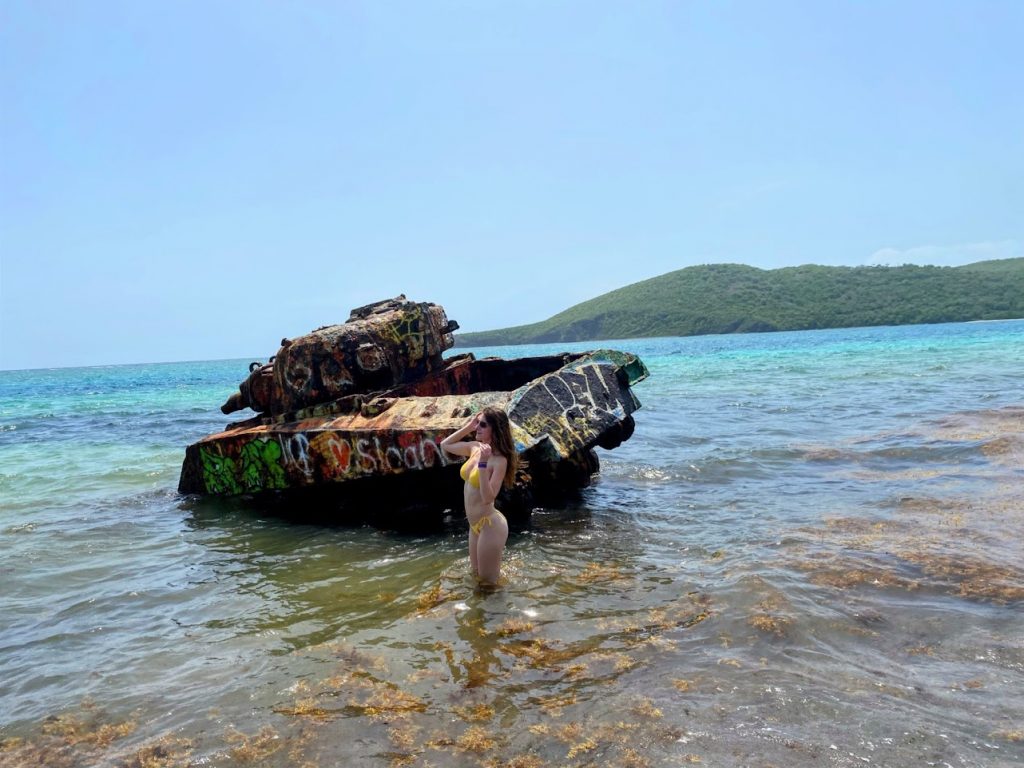 A picture of Julia standing next to one of the World War II tanks located on the island of Culebra, which is east of Puerto Rico's mainland.